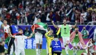 Jordan's players celebrate after defeating South Korea during the AFC Asian Cup Qatar 2023 semi-final match at the Ahmad Bin Ali Stadium on February 6, 2024. (Pic by Mohamed Farag / The Peninsula)