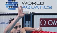 Ukraine’s Vladyslav Bukhov reacts after winning the men’s 50m freestyle swimming final. AFP