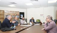 Professor Dr. Yamine Boudhane (left), Lecturer Dr. Mohsen M. S. Alafranji (first right), Associate Professor Dr. Kamal Hamidou (second left), Prof. Dr. Abdulrahman Mohammed Al Shami (second right), and Abdul Hamid Samouh Maassarani, Lab Technician, during a seminar at the Department of Mass Communication, Qatar University, yesterday. (Photo: Salim Matramkot,The Peninsula)