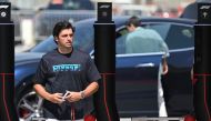 Ferrari's Spanish driver Carlos Sainz Jr arrives at the Bahrain International Circuit ahead of the Bahrain Formula One Grand Prix in Sakhir on February 28, 2024. (Photo by ANDREJ ISAKOVIC / AFP)