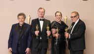 (L-R) Al Pacino poses with Christopher Nolan, Emma Thomas, and Charles Roven, winners of the Best Picture award for “Oppenheimer”, in the press room during the 96th Annual Academy Awards at Ovation Hollywood on March 10, 2024 in Hollywood, California. Rodin Eckenroth/Getty Images/AFP 