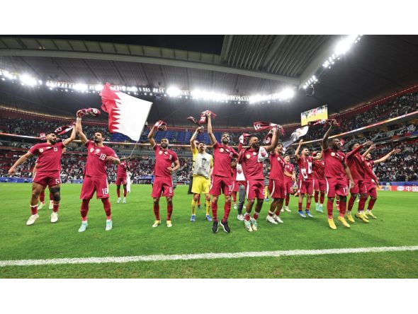 Qatari players celebrating their victory.