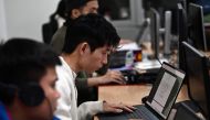 This photo taken on March 1, 2024 shows students at Hanoi University of Science and Technology studying integrated circuit design in a classroom in Hanoi. Photo by Nhac NGUYEN / AFP