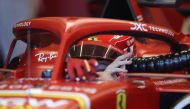 Ferrari's Monegasque driver Charles Leclerc drives in the pit lane during the second practice session of the Formula One Australian Grand Prix at the Albert Park Circuit in Melbourne on March 22, 2024. (Photo by Martin KEEP / AFP) 