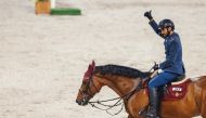 Mohammed Saeed Haidan celebrates astride Obama after winning the Big Tour round.