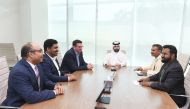 Acting Executive Director of the Qatar Environment and Energy Research Institute, Dr. Tareq Al Ansari (centre) and other QEERI officials during the interview with The Peninsula team.