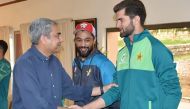 :This handout photograph taken and released by Pakistan痴 Cricket Board (PCB) on April 1, 2024, shows PCB Chairman Mohsin Naqvi (L) meets with cricketer Shaheen Shah Afridi (R) during his visit Pakistan team fitness camp being conducted by trainers from the Pakistan Army in Kakul, Abbottabad eastern Khyber Pakhtunkhwa province. (Photo by Pakistan Cricket Board (PCB) / AFP)