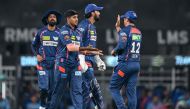 Lucknow Super Giants' Yash Thakur (2L) celebrates with teammates after taking the wicket of Gujarat Titans' Vijay Shankar during the Indian Premier League (IPL) Twenty20 cricket match between Lucknow Super Giants and Gujarat Titans at the Ekana Cricket Stadium in Lucknow on April 7, 2024. (Photo by Sajjad HUSSAIN / AFP)
