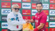 Himanshu Rathod receives his man-of-the -match award