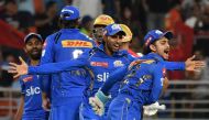 Mumbai Indians' players celebrate their win at the end of the Indian Premier League (IPL) Twenty20 cricket match between Punjab Kings and Mumbai Indians at the Maharaja Yadavindra Singh International Cricket Stadium in Mohali on April 18, 2024. (Photo by AFP)