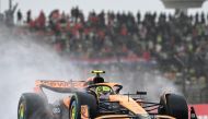 McLaren's British driver Lando Norris drives during the sprint qualifying session ahead of the Formula One Chinese Grand Prix at the Shanghai International Circuit in Shanghai on April 19, 2024. (Photo by GREG BAKER / AFP)