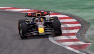 Red Bull Racing's Dutch driver Max Verstappen drives during the sprint race ahead of the Formula One Chinese Grand Prix at the Shanghai International Circuit in Shanghai on April 20, 2024. (Photo by Pedro Pardo / AFP)