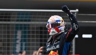 Red Bull Racing's Dutch driver Max Verstappen celebrates after winning the the Formula One Chinese Grand Prix at the Shanghai International Circuit in Shanghai on April 21, 2024. (Photo by Hector RETAMAL / AFP)