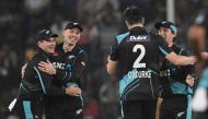 New Zealand's captain Michael Bracewell (2L) celebrates with teammate Dean Foxcroft (L) after dismisssal of Pakistan's captain Babar Azam during the fourth Twenty20 international cricket match between Pakistan and New Zealand at the Gaddafi Cricket Stadium in Lahore on April 25, 2024. (Photo by Aamir QURESHI / AFP)
