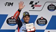 Ducati Spanish rider Marc Marquez celebrates after taking the pole position during the qualifier session of the MotoGP Spanish Grand Prix at the Jerez racetrack in Jerez de la Frontera on April 27, 2024. (Photo by Jorge Guerrero / AFP)