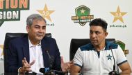 Pakistan Cricket Board (PCB) chairman Mohsin Naqvi (L) along with former Pakistan痴 cricketer and assistant coach Azhar Mahmood takes part in a media briefing in Lahore on April 28, 2024. (Photo by Arif Ali / AFP)