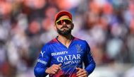 Royal Challengers Bengaluru's Virat Kohli looks on during the Indian Premier League (IPL) Twenty20 cricket match between Gujarat Titans and Royal Challengers Bengaluru at the Narendra Modi Stadium in Ahmedabad on April 28, 2024. (Photo by Punit PARANJPE / AFP)