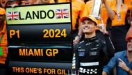 Race winner Lando Norris of Great Britain and McLaren celebrates victory with his team after the F1 Grand Prix of Miami at Miami International Autodrome on May 05, 2024 in Miami, Florida. Chris Graythen/Getty Images/AFP 