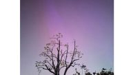 Northern lights or aurora borealis are seen over London during a geomagnetic storm on May 11, 2024. (Photo by Rosanna Normanton / AFP)