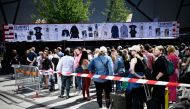 Fans are queuing outside Friends arena in Stockholm, Sweden May 17, 2024 before a concert of US singer-songwriter Taylor Swift on her Eras Tour. (Photo by Pontus LUNDAHL / TT News Agency / AFP) 