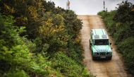 An Ineos hydrogen fuelled Grenadier car is driven off-road on a test track during a 