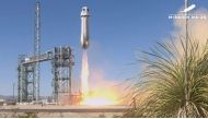 This screen grab taken from a Blue Origin broadcast shows the Mission NS-25, with the New Shepard 4 rocket and crew capsule, taking off from the Blue Origin base near Van Horn, Texas, on May 19, 2024. Photo by HANDOUT / BLUE ORIGIN / AFP