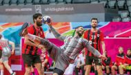 An Al Duhail players prepares to shoot at the goal.