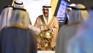 Kuwait Amir HH Sheikh Mishal Al-Ahmad Al-Jaber Al-Sabah (C) turns a symbolic equipment during the opening of the Al-Zour oil Refinery on May 29, 2024, in al-Zour, south of Kuwait City. (Photo by Yasser Al-Zayyat / AFP)