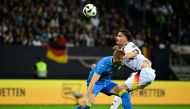 Ukraine's forward #11 Artem Dovbyk and Germany's defender #24 Robin Koch vie for the ball during the friendly football match Germany v Ukraine, in Nuremberg, eastern Germany, on June 3, 2024. (Photo by Tobias Schwarz / AFP)