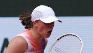 Poland's Iga Swiatek reacts after a point during her women's singles quarter final match against Czech Republic's Marketa Vondrousova on Court Philippe-Chatrier on day ten of the French Open tennis tournament at the Roland Garros Complex in Paris on June 4, 2024. (Photo by Dimitar DILKOFF / AFP)