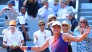 Poland's Iga Swiatek celebrates after winning against US Coco Gauff at the end of their women's singles semi final match on Court Philippe-Chatrier on day twelve of the French Open tennis tournament at the Roland Garros Complex in Paris on June 6, 2024. Photo by Emmanuel Dunand / AFP.