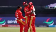 Dilpreet Bajwa, Shreyas Movva and Saad Bin Zafar of Canada celebrate after the team's victory during the ICC Men's T20 Cricket World Cup West Indies & USA 2024 match between Canada and Ireland at Nassau County International Cricket Stadium on June 7, 2024 in New York, New York. (Photo by Robert Cianflone/Getty Images/AFP)

