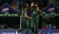 Bangladesh's vice-captain Taskin Ahmed (L) and Bangladesh's Rishad Hossain celebrate the dismissal of Sri Lanka's Dasun Shanaka (out of frame) at the Grand Prairie Cricket Stadium in Grand Prairie, Texas, on June 7, 2024. (Photo by Andrew Caballero-Reynolds / AFP)
 