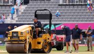 Members of the grounds staff prepare the pitch prior to the ICC Men's T20 Cricket World Cup West Indies & USA 2024 match between India and Pakistan at Nassau County International Cricket Stadium in New York. AFP