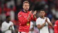 England's striker #09 Harry Kane applauds fans on the pitch after the International friendly football match between England and Iceland at Wembley Stadium in London on June 7, 2024. Photo by Glyn KIRK / AFP