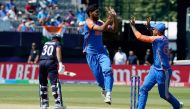 India's Arshdeep Singh celebrates a successful lbw with teammate India's Suryakumar Yadav (R) during the ICC men's Twenty20 World Cup 2024 group A cricket match between the USA and India at Nassau County International Cricket Stadium in East Meadow, New York on June 12, 2024. (Photo by Timothy A. Clary / AFP)