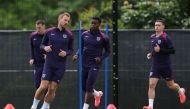 England's forward #09 Harry Kane (L) and his teammates take part in a training session during the UEFA Euro 2024 European football Championship, in Blankenhain, eastern Germany on June 15, 2024. (Photo by Adrian Dennis/ AFP)