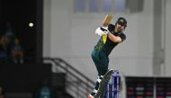 Australia's Travis Head plays a shot during the ICC men's Twenty20 World Cup 2024 group B cricket match between Australia and Scotland at Daren Sammy Cricket Ground in Gros Islet, St. Lucia, June 15, 2024. (Photo by Timothy A. Clary / AFP)