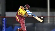 West Indies' Nicholas Pooran plays a shot during match between the West Indies and Afghanistan at Daren Sammy Cricket Ground in Gros Islet, St. Lucia, June 17, 2024. (Photo by Timothy A. Clary / AFP)