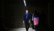 (Files) Belgium fashion designer Dries Van Noten acknowledges the audience after presenting creations by Dries Van Noten for the Women Ready-to-wear Fall-Winter 2024/2025 collection on February 28, 2024. (Photo by Julien De Rosa / AFP)