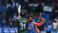 India's Kuldeep Yadav celebrates an lbw out of Bangladesh's Tanzid Hasan Tamim during the ICC men's Twenty20 World Cup 2024 Super Eight cricket match between India and Bangladesh at Sir Vivian Richards Stadium in North Sound, Antigua and Barbuda, on June 22, 2024. (Photo by ANDREW CABALLERO-REYNOLDS / AFP)
