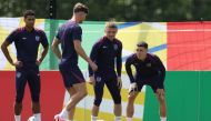 (From L) England's midfielder #10 Jude Bellingham, England's defender #05 John Stones, England's defender #12 Kieran Trippier and England's midfielder #11 Phil Foden attend a MD-1 training session during the UEFA Euro 2024 European Football Championship, at the team's base camp in Blankenhain, Thuringia, on June 24, 2024, on the eve of their UEFA Euro 2024 Group C football match against Slovenia. (Photo by Adrian DENNIS / AFP)
