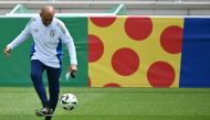 Italy's head coach Luciano Spalletti controls the ball during an MD-1 training session at the base camp in Iserlohn on June 28, 2024, on the eve of their UEFA Euro 2024 Round of 16 football match against Switzerland. (Photo by Alberto Pizzoli / AFP)