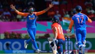 Axar Patel (left) of India celebrates the dismissal of Moeen Ali of England during the ICC men's Twenty20 World Cup 2024 semi-final cricket match between India and England at Providence Stadium in Georgetown, Guyana, on June 27, 2024. (Photo by Randy Brooks / AFP)