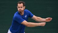 Britain's Andy Murray warms up during a training session ahead of the 2024 Wimbledon Championships at The All England Lawn Tennis and Croquet Club in Wimbledon, southwest London, on June 30, 2024. (Photo by Glyn KIRK / AFP)
