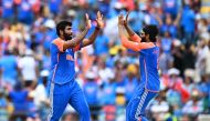 India's Jasprit Bumrah (L) celebrates with India's Ravindra Jadeja after dismissing South Africa's Marco Jansen during the ICC men's Twenty20 World Cup 2024 final cricket match between India and South Africa at Kensington Oval in Bridgetown, Barbados, on June 29, 2024. (Photo by Chandan Khanna / AFP)
