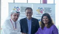 Sheikh Dr. Khalid bin Jabor Al Thani, Chairman of QCS; Yang Berhormat Datuk Seri Dr. Haji Dzulkefly Ahmad, Health Minister of Malaysia; and Dr. Saunthari Somasundaram, President of NCSM and co-chairperson of NCD Malaysia during the signing ceremony. 