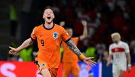 Netherlands' forward #09 Wout Weghorst celebrates at the final whistle after the UEFA Euro 2024 quarter-final football match on July 6, 2024. (Photo by John MacDougall / AFP)