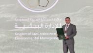 Dr. Abdullah Al Swidi with the award.