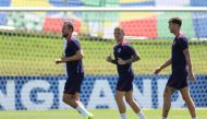 (From L) England's forward Harry Kane and defender Kieran Trippier take part in a training session on July 9, 2024. (Photo by Adrian Dennis / AFP)
